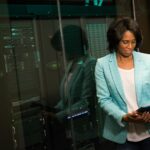 software engineer looking at an ipad